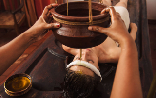 Introduction to Panchakarma: a woman getting, Ayurvedic therapy, Shirodhara treatment