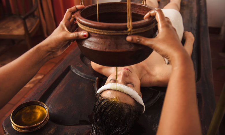 Introduction to Panchakarma: a woman getting, Ayurvedic therapy, Shirodhara treatment