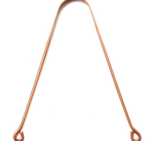 A copper tongue scraper